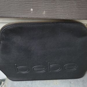 Bebe Sleek Black Zippered Pouch‎
